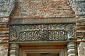 Angkor - Eastern Mebon - remarkable sculpted sandstone lintels of the temple towers